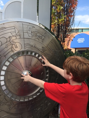 David spins the Wheel through Time, one of the stops on Asheville's Urban Tour.